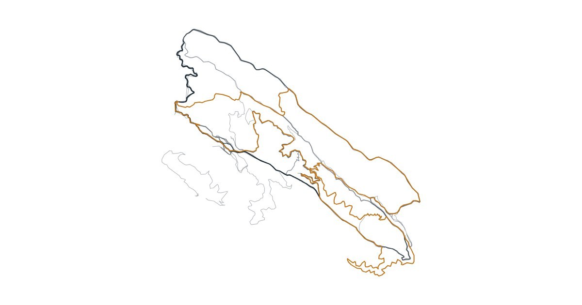 Trail routes in the East Bay hills drawn as thin overlapping lines, with race routes in amber.